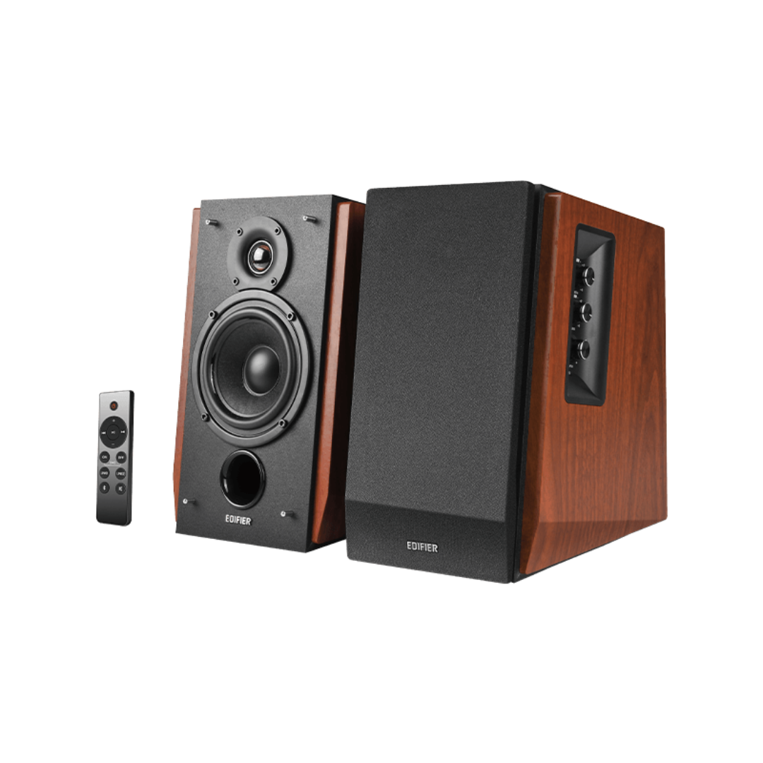 Front view of stylish wood brown Edifier R1700BTs speakers – one with front grill, one without, and a sleek grey remote control.