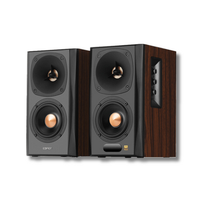 Two brown-wood effect Edifier S360DB speakers, angled to showcase the front and side, revealing volume controls on one of the speakers.