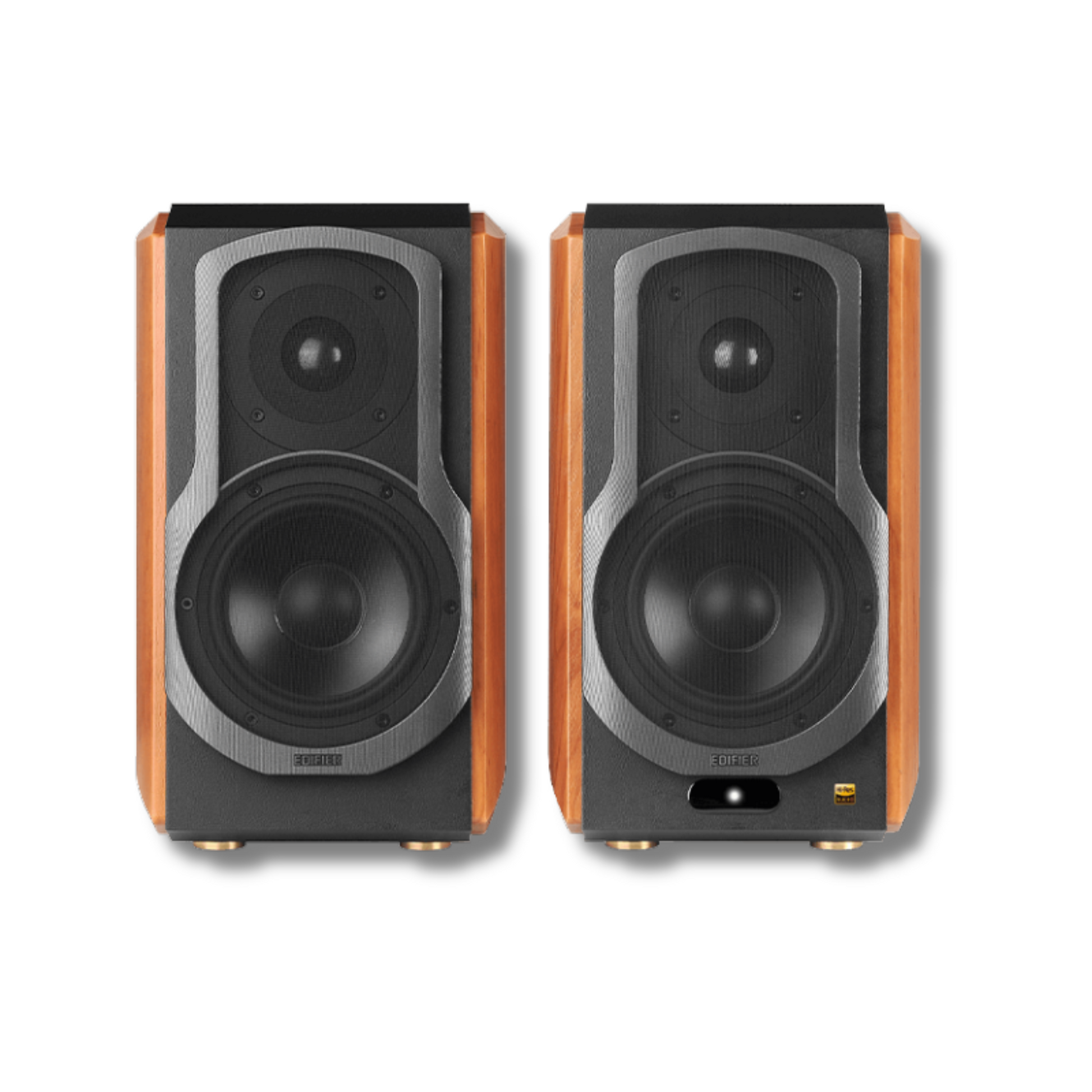 A close up of the fronts of two wood brown Edifier bookshelf speakers, with the brand name visible at the bottom of each speaker cabinet.